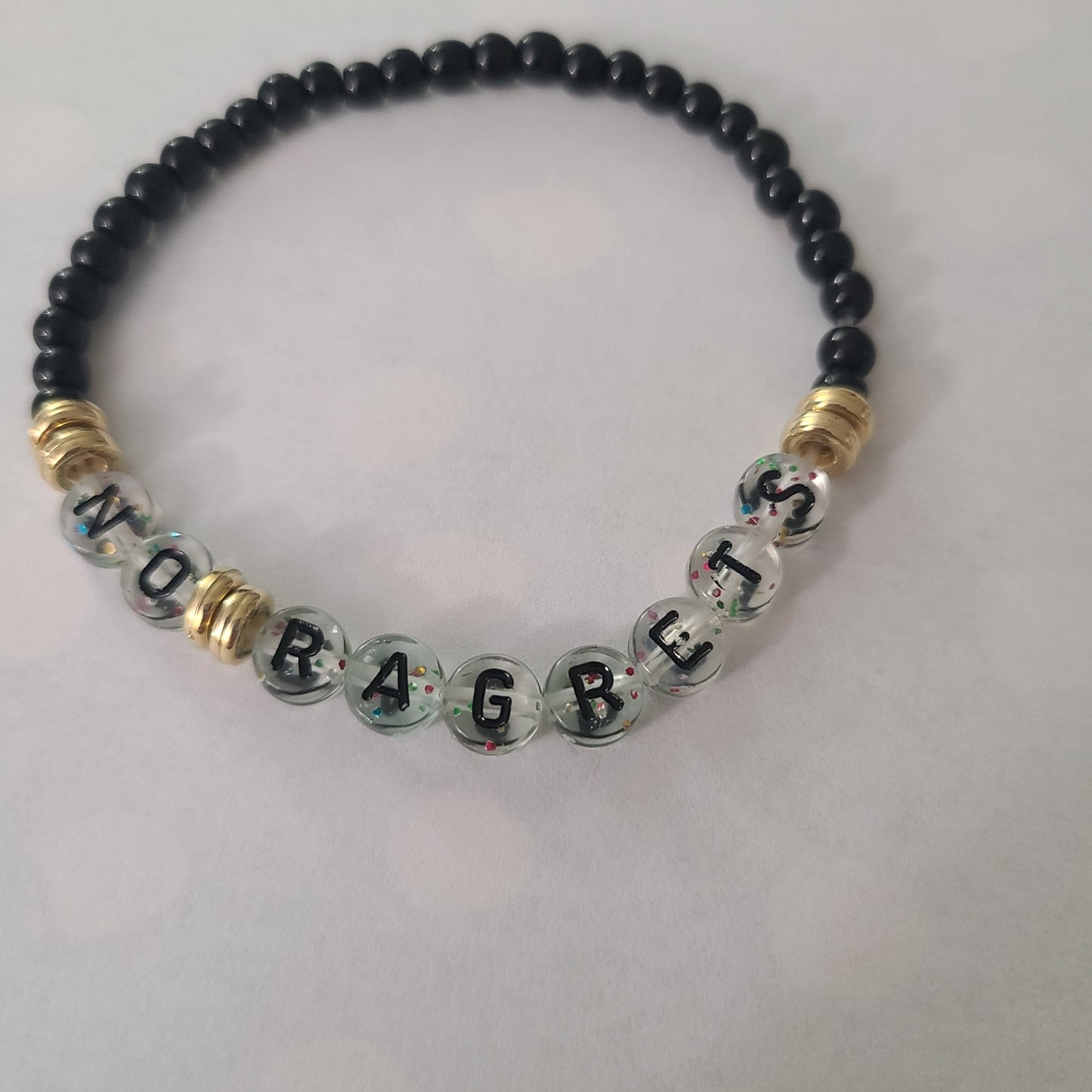 Bracelet NO "RAGRETS" - glass obisidian beads