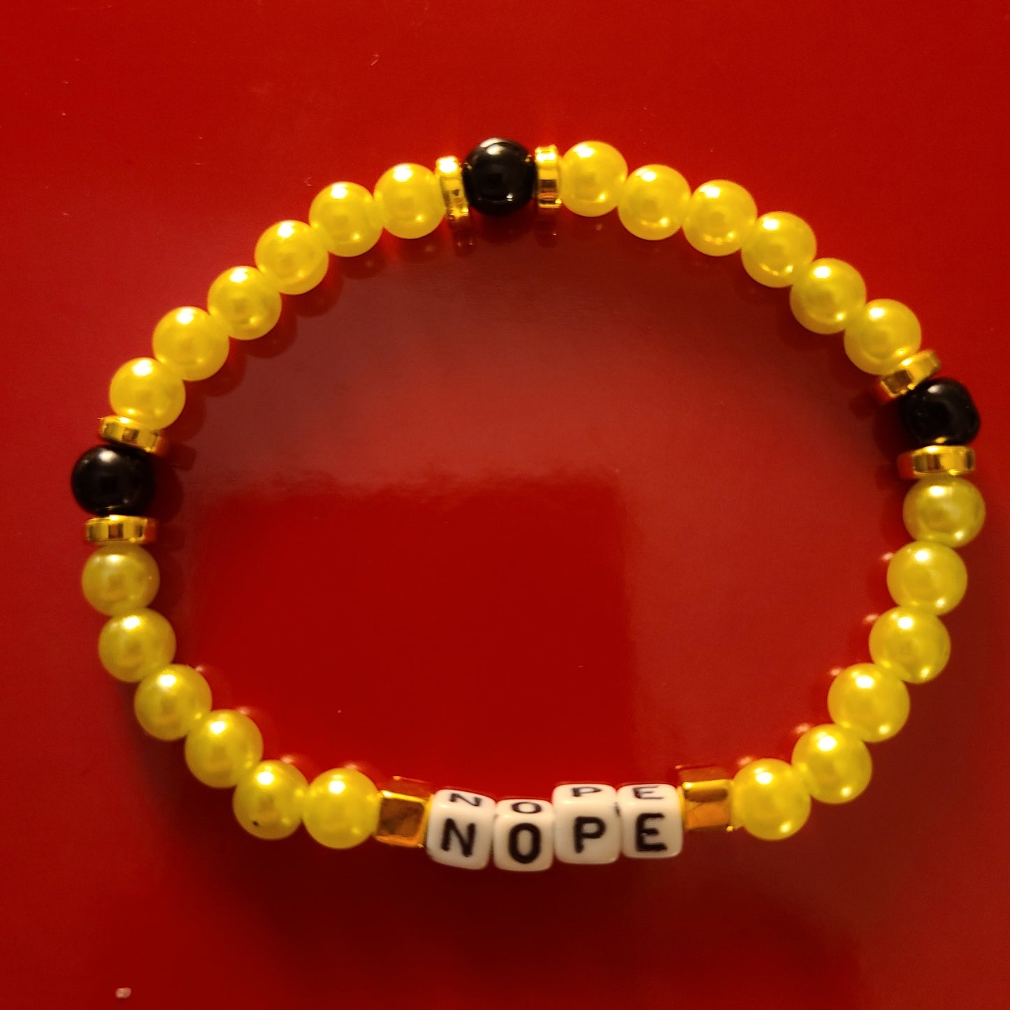 Bracelet NOPE - acrylic beads and glass obsidian beads